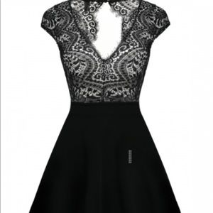 Black cocktail lace dress size S-6 New with tags.